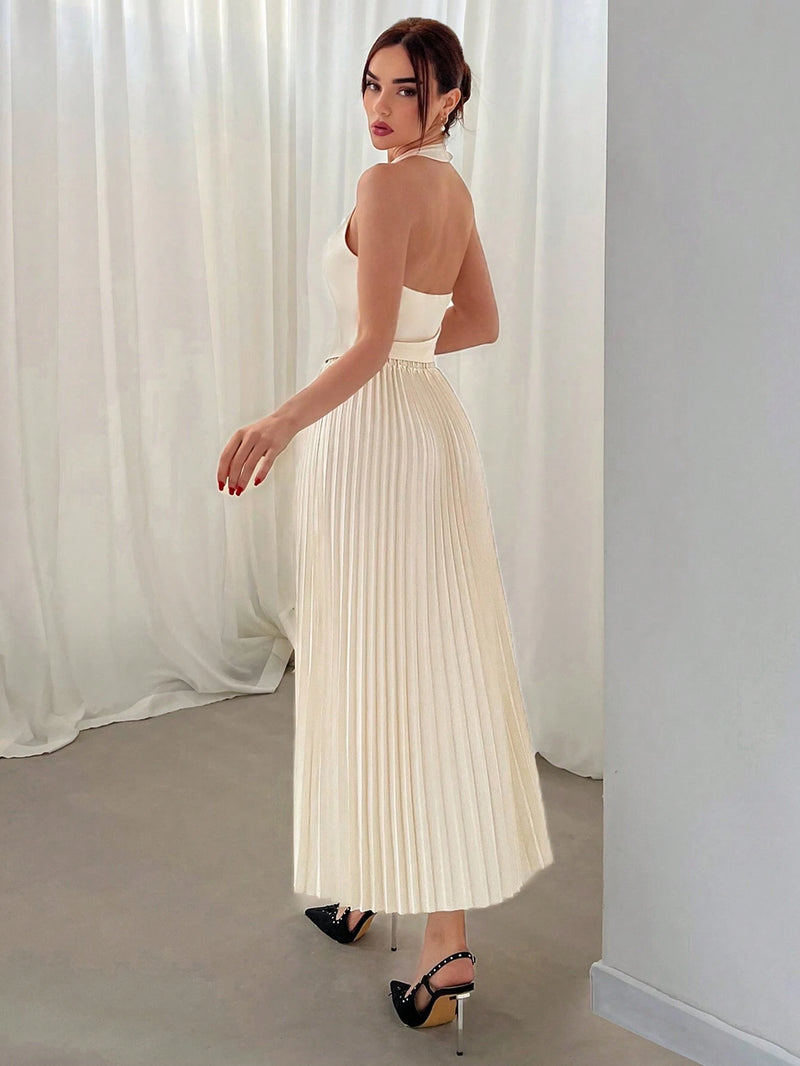 Colete Elegância e Saia Plissada